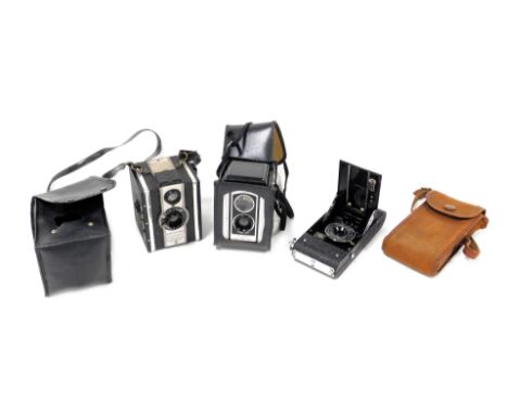 A Soho Myna all distance camera, Coronet Twelve-20 camera, and a Kodak Duaflex II camera, all cased. (3)
