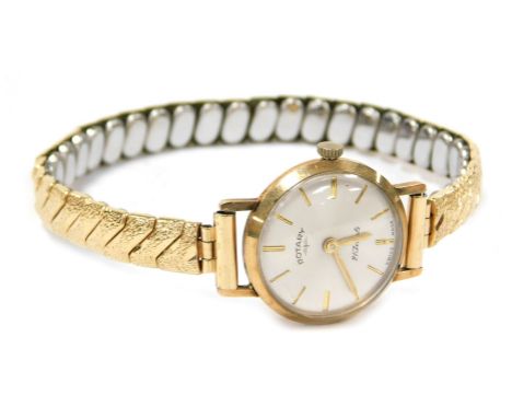A Rotary lady's 9ct gold cased wristwatch, circular silvered dial with batons, twenty one jewelled movement, on a plated stra