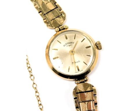 A Rotary lady's 9ct gold cased wristwatch, circular champagne dial with batons, twenty one jewel movement, on a 9ct gold stra