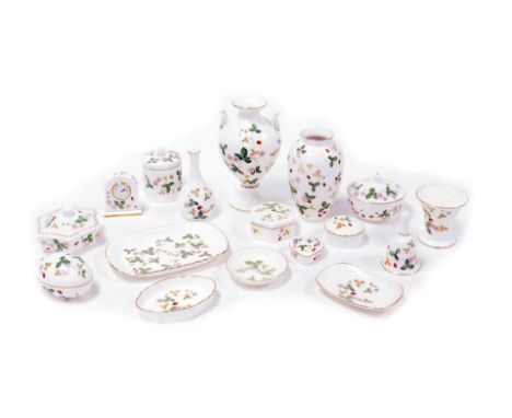 A group of Wedgwood porcelain Wild Strawberry pattern ornaments, including boxes and covers, vases, a bell, bedside clock, an