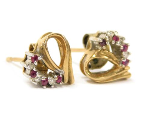 A pair of ruby and diamond earrings, in a heart shaped open setting, stamped 9k, 1.6g.