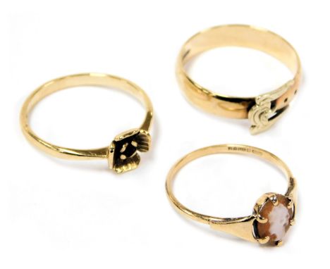 A 9ct two colour gold band, in a belt and buckle design, size N, a 9ct gold and shell cameo ring, bust portrait of a lady, si