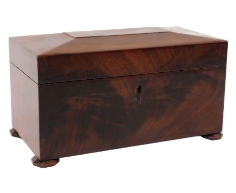 A Regency mahogany tea caddy, of sarcophagus form, raised on octagonal feet, 15cm high, 31cm wide, 16cm deep. (AF)