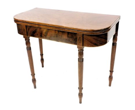 An early 19thC mahogany demi lune fold over card table, with line inlay, raised on turned legs, 78cm high, 96cm wide, 47cm de