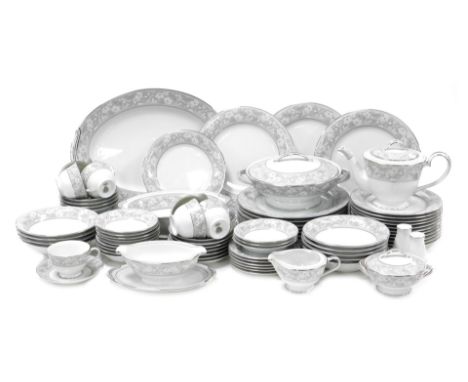 A Noritake porcelain Greycrest pattern dinner and tea service, comprising two graduated meat platters, vegetable tureen and c