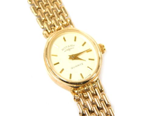 A Rotary lady's 9ct rose gold cased wristwatch, oval champagne dial, quartz movement, on a bracelet strap, 15.3g all in.