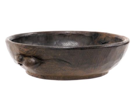 A Robert Thompson of Kilburn 'Mouseman' oak fruit bowl, carved to the side with a mouse, 24cm wide. 