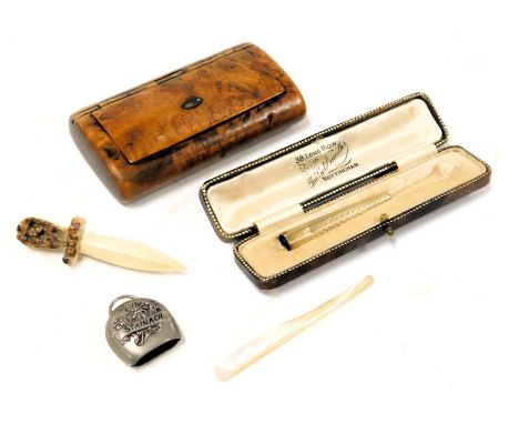 An early 20thC cigarette holder, with engraved decoration, mouthpiece lacking, yellow metal, stamped 9ct, 4.2g, a 19thC burr 