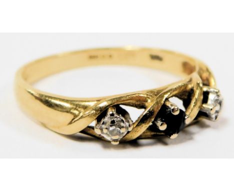 An 18ct gold sapphire and diamond three stone ring, size O, 2.9g.