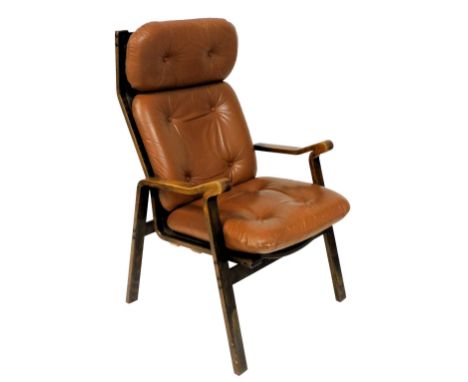 A mid century Scandinavian bentwood armchair, with button tan leather headrest and cushions, 64cm wide.