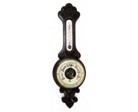 A Victorian oak barometer, with thermometer, within a carved case, 80cm high.