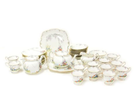 An early 20thC Paragon porcelain Merrivale pattern porcelain tea service, comprising teapot, lidded hot water jug, cream jug,