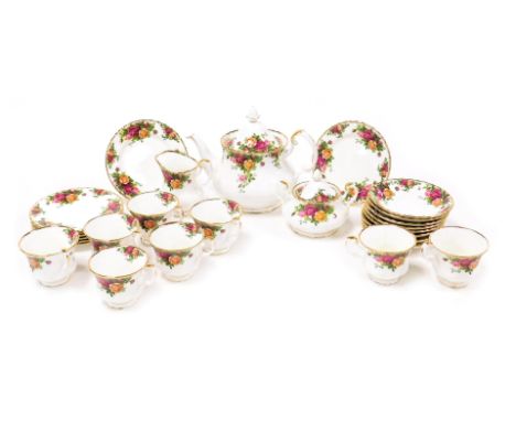 A Royal Albert porcelain Old Country Roses tea service, comprising tea pot, cream jug, sucrier, eight tea cups, saucers and p