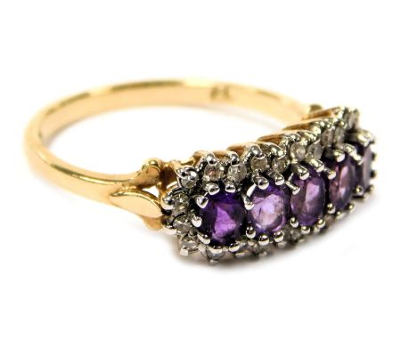 A 9ct gold amethyst and diamond ring, set with five amethysts in a surround of diamonds, size N, 2.6g. 