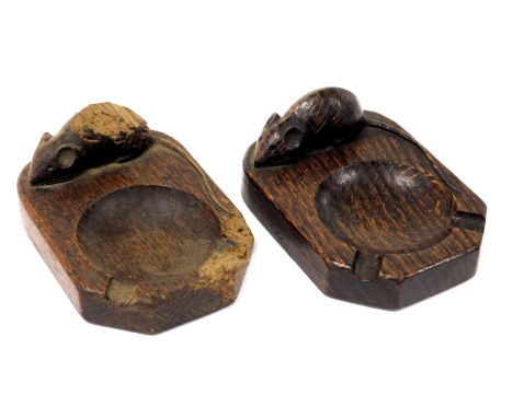 A Robert Thompson of Kilburn 'Mouseman' oak ashtray, carved to the top with a mouse, 10cm deep and another similar. (2)(AF)