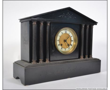 A Victorian HAC - Hamburg America Clock Co 8 day slate mantel clock. Striking on a gong with decorative facia and slate case 