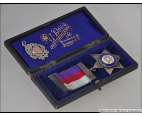 A silver hallmarked enamel masonic medal and ribbon from the Queen Alexandria Lodge - RAOB Primo GLE Ltd. Awarded to Primo WH