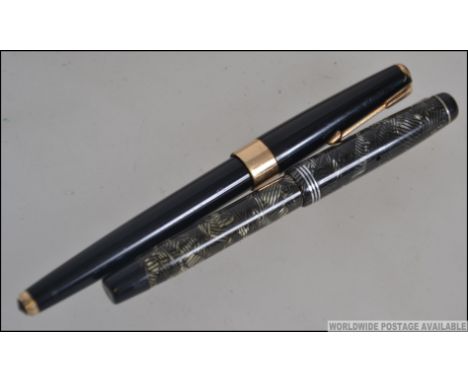 Two vintage 20th century Parker fountain pens both Parkers having gold  metal nibs