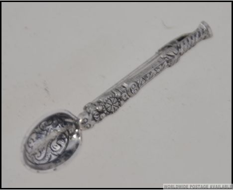 A silver hallmarked ladies brooch in the form of a spoon complete in a leather Murray Ward for Liberty presentation case. Hal