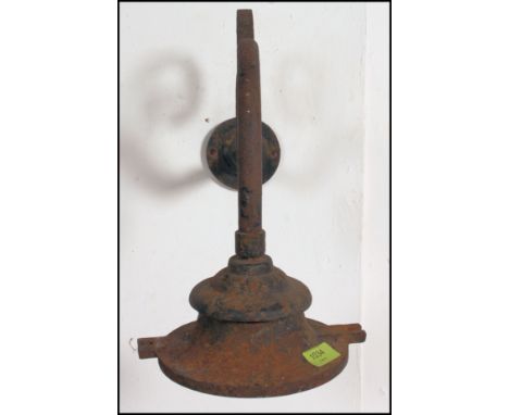 A vintage 20th century industrial factory metal factory external light fixture having wrought iron scroll work. Measure: 37cm