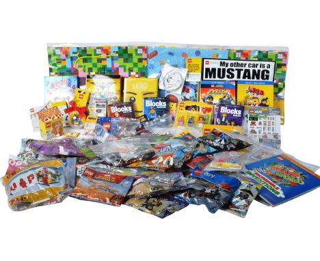A large collection of assorted mini Lego sets, key rings, promotional items and other accessories. Items to include x24 minat