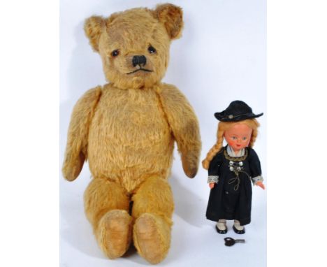 An original vintage English teddy bear likely Chad Valley / Merrythought with golden mohair, beaded eyes and ' Made In Englan