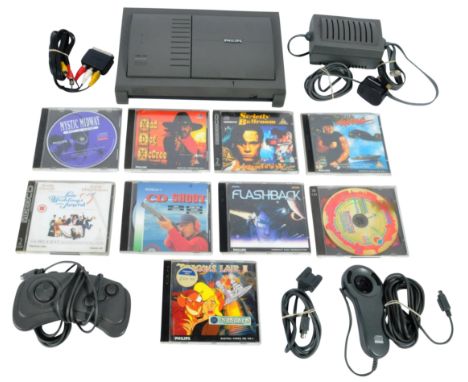 An original Phillips made CDI 450 CD Interactive Player CD Audio &amp; Photo-CD video computer games console with games and a
