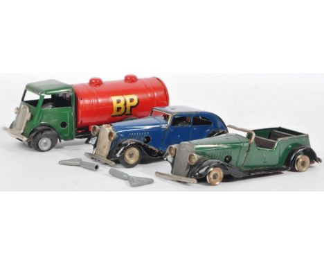 A collection of three original vintage 1950's Triang / Tri-Ang Minic made clockwork tinplate model vehicles comprising a BP p