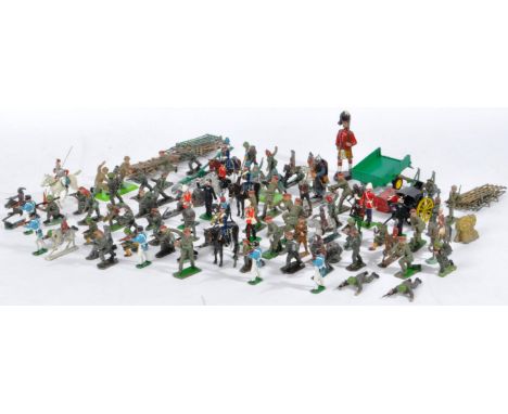 A large collection of assorted vintage lead and plastic toy soldiers / figures by makers Britains / Deetail, Crescent Toys, L