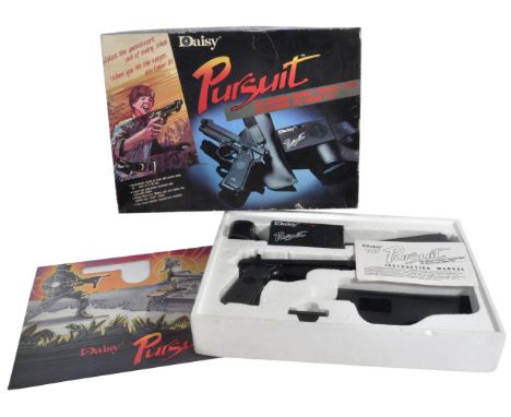 An original vintage Daisy made ' Pursuit ' Infrared Combat Survival Game. Appears complete and likely unused (unchecked) - co