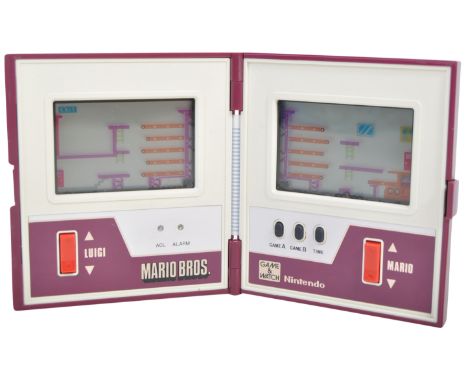 Game &amp; Watch - an original vintage 1980s (1983) Nintendo made Mario Bros Game and Watch handheld games console. Complete 