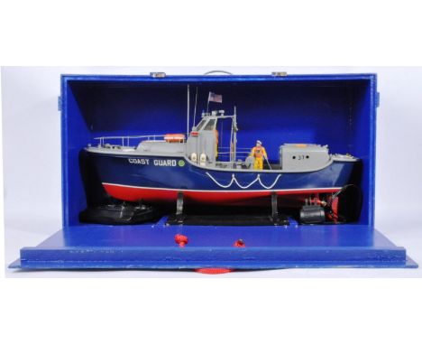 A large scale RC radio controlled model of an American Coast Guard cutter boat. Highly detailed, with lots of deck decoration