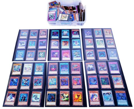 A large collection of Konami made Yu-Gi-Oh Yugioh trading cards to include many first edition cards, holographic holo shinies