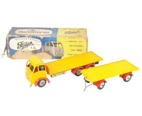 A rare vintage Shackleton Toys made scale precision diecast model clockwork mechanical ' Foden ' wagon / lorry. In yellow and