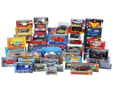 A large collection of approximately x45 assorted boxed diecast model cars of various scales and makers comprising; Matchbox, 
