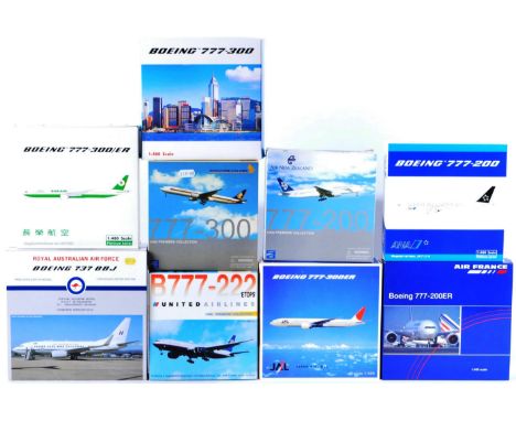 A collection of x9 assorted 1/400 scale (and x1 other) boxed diecast model planes, largely Boeing 777 examples by makers Drag