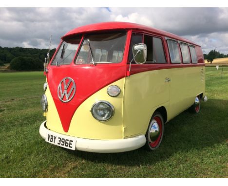 A 1967 left hand drive Volkswagen Splitscreen Sundial camper, registration number VBY 396E, red over yellow. This rare Sundia