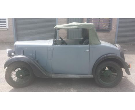 A 1936 Austin Seven Opal, registration number DOF 563, blue over black. Introduced in 1934, the Opal and its sibling Ruby and