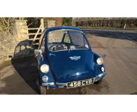 A 1964 Heinkel Trojan 200, registration number 458 CVB, blue. Designed by Heinkel Flugzeugwerke, this micro car was produced 