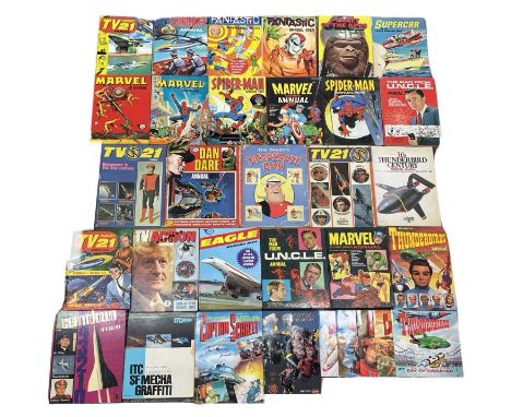 A large collection of vintage comic book and popular culture annuals and ephemera, to include: - Captain Scarlet- Marvel- Man