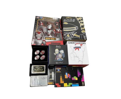 A mixed lot of various boxed Lootcrate exclusive figures, to include: - Iron Man: Mark V die-cast figure - Power Rangers - Al