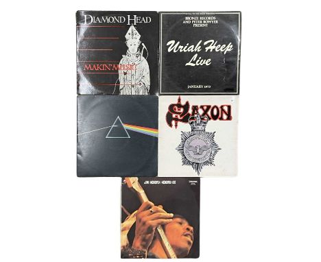 A collection of Heavy Metal / rock 12" vinyl LPs, to include: - Uriah Heep Live - January 1973: ISLD1 - Saxon - Strong Arm of