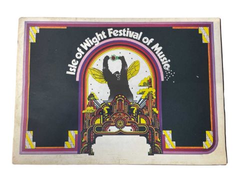 A 1969 Isle of Wight Music Festival programme, featuring Bob Dylan, The Who, Joe Cocker and Free etc.One page was removed fro