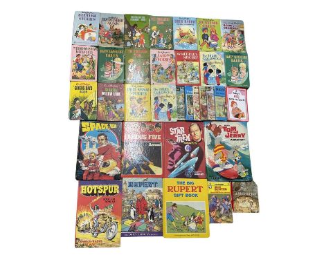 A collection of vintage children's books and annuals, to include: - Enid Blyton - Ladybird - Rupert - Space: 1999 - Star Trek