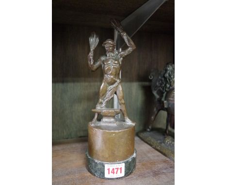 A bronze figure of a man with anvil,Â&nbsp;inscribed 'RSH 1920-1927 WG', on serpentine base, total height 25cm high. 