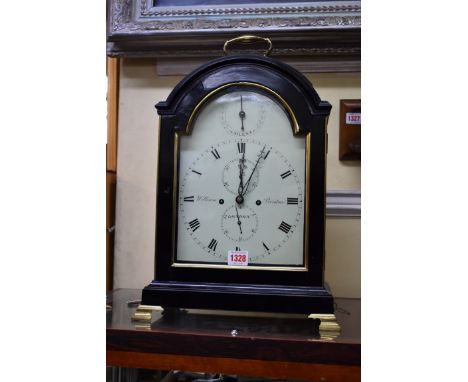 A Regency ebonized pad top&nbsp;bracket clock,&nbsp;the 8in arched painted dial inscribed 'William Bristow, London', with twi