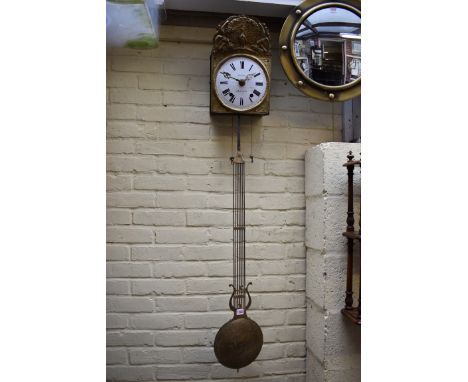 A French brass comtoise wall clock, the 8½in enamel dial inscribed 'Cruese, a Malestroit', with weights and brass pendulum. 