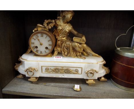 A Louis XVI style gilt metal and alabaster figural mantel clock, 40cm wide, with pendulum. 