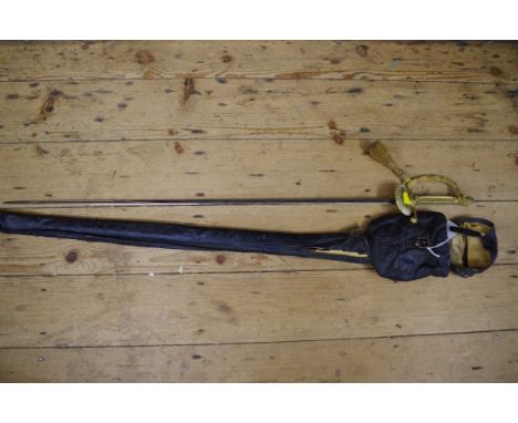 An Elizabeth II court sword and brass mounted leather scabbard,&nbsp;with gilt braiding and tassel and leather outer bag. 