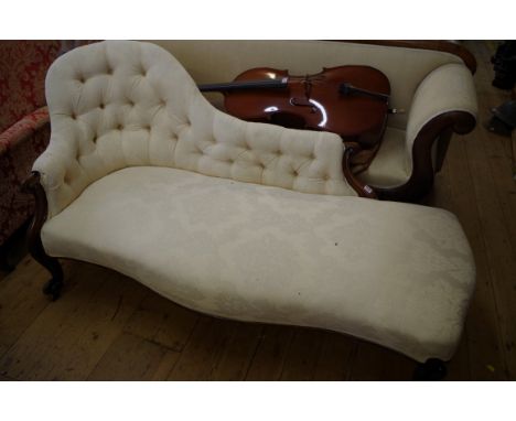 A Victorian rosewood and button upholstered chaise longue, with ivory damask fabric. 